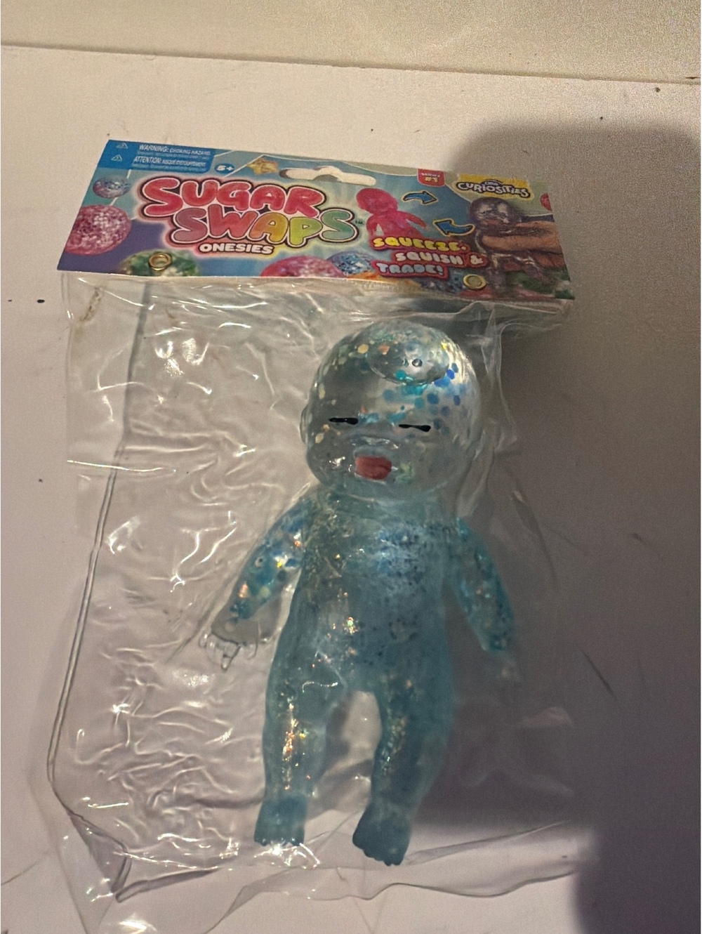 Sugar Shapes Onesies Squeeze Squish Frooty Toy - Blue Glitter Figure